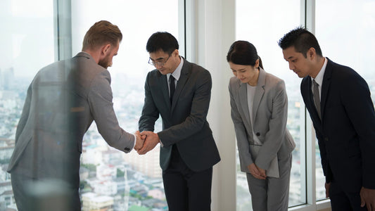 2 CEOs bow and shake hands as their retinue bows and looks on. Signing an FSA is like this, minus touching some dude's greasy hands and bowing a thousand times as each party leaves.