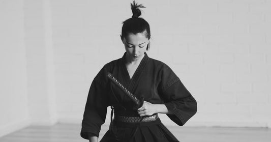 While you were fapping in your basement, I was mastering the art of the e-commerce sale. Oh yeah, this is a black and white picture of a modern-day lady samurai.